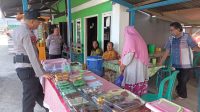 Kapolsek Ampana Kota Jumat Curhat Sambangi Pedagang Kue di Kelurahan Dondo