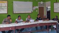 Bhabinkamtibmas Polsubsektor Tojo Barat Polsek Tojo Hadiri Rapat Pleno DPHP Tingkat Desa