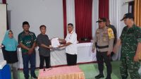 Bentuk Dukungan Kapolsek Hadiri Rapat Pleno Terbuka Rekapitulasi DPHP Tingkat Kecamatan Ulubongka