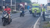 Beri Rasa Aman Bagi Masyarakat, Sat Lantas Polres Touna Laksanakan Pengaturan Lalu Lintas Pagi Hari