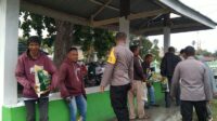 Jelang Hari Bhayangkara ke-77, Kapolsek Ampana Kota Bagikan Sembako Kepada Tukang Bentor dan Ojek