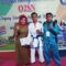 Fachriel Mahmud bersama Kadis Pendidikan Provinsi Sulteng dan Pelatih Usai Menerima Piagam Juara 1 Cabang Olah Raga Karate Putra O2SN SMK.