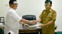 Jabatan Kepala Dinas Komunikasi dan Informatika Kabupaten Touna Diserah Terimakan