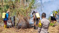 Kebakaran Lahan di Desa Tayawa, Tim Gabungan Bersama Masyarakat Terus Berjibaku Padamkan Api