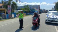 Meski di hari libur, Satlantas Polres Touna tetap melayani Masyarakat dengan Pengaturan Arus Lalin Pagi