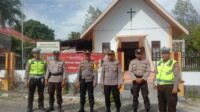 Kapolsek Ampana Kota Cek Personil Pam Ibadah Misa Perayaan Natal ke-2 di Gereja