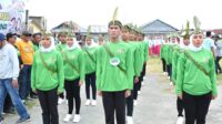 Lomba Gerak jalan Kreasi Warnai Semarak Peringatan HUT Kabupaten Touna ke-20