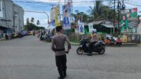 Polres Touna Lakukan Pengamanan Gerak Jalan Kreasi Dalam Rangka HUT Kabupaten Touna