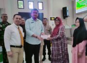 Bupati Touna Serahkan Secara Simbolis Bantuan Tunai