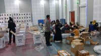 Komitmen Sukseskan Pemilu, Polres Touna Amankan Packing Surat Suara