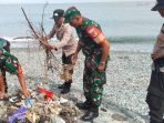 Karya Bakti TNI, Koramil Ratolindo bersama Polsek Ampana Kota Bersinergi bersihkan sampah di Pantai