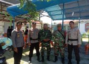 Sinergitas TNI-Polri di Touna Lakukan Pengamanan Rapat Pleno Rekapitulasi Hasil Perhitungan Perolehan Suara Pemilu