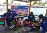 Tumbuhkan Minat Baca Masyarakat Satpolairud Polres Touna Hadirkan Perpustakaan Terapung