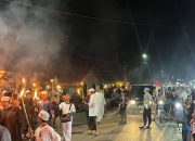 Polisi Kawal Pawai Obor Dalam Rangka Menyambut Bulan Suci Ramadhan 1445 H di Touna