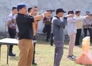 Pj Sekda Touna Ikuti Latihan Menembak Dalam Rangka Menyambut Hari Bhayangkara Ke-79