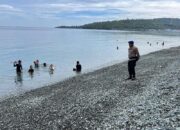 Satpolairud Polres Touna Amankan Objek Wisata Pantai, Imbau Pengunjung Jaga Keselamatan dan Kebersihan