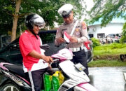 Satlantas Polres Touna Ajak Masyarakat Kibarkan Semangat Merah Putih Lewat Gerakan Polantas Menyapa