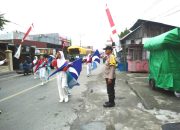 Kolaborasi Polsek dan Satlantas Polres Touna Amankan Jalan Santai Reuni SMK N 1 Ampana Kota