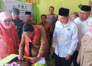 Launching Kampung Zakat di Desa Uekambuno, Bupati Ilham Lawidu Ajak Masyarakat Semakin Sadar Membayar Zakat