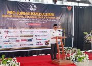 Hadiri Seminar Nasional DPD PJS Touna, Bupati Ilham Lawidu: Wartawan Mitra Kerja Pemerintah Daerah, Bukan Lawan