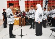 Bupati Ilham Kukuhkan Hajar Lawidu sebagai Ibunda Guru PGRI Touna Masa Bakti 2025–2030