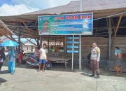 Polsek Walea Kepulauan Pasang Spanduk “STOP BOOM IKAN” di Pusat Pasar Kabalutan