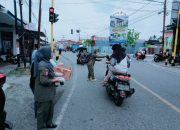 Lewat Pembagian Takjil, Satpol PP Touna Tebar Kebaikan di Bulan Ramadan