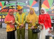 Bupati Ilham Lawidu Bersama Ketua TP PKK Touna Hadiri Peringatan HUT Kabupaten Bone Ke-69 Tahun