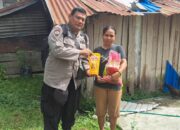 Wujud Empati Polri, Satbinmas Polres Touna Salurkan Beras dan Minyak untuk Warga Membutuhkan