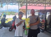 Kendalikan Harga Pangan, Sat Binmas Polres Touna dan Bulog Gelar Pasar Beras Murah di Ampana Tete
