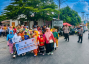 Polres Touna Terjunkan Personel Amankan Karnaval Budaya PGRI di Ampana Kota