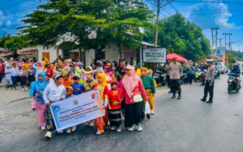 Polres Touna Terjunkan Personel Amankan Karnaval Budaya PGRI di Ampana Kota
