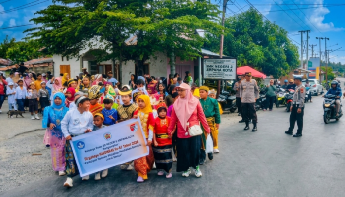Polres Touna Terjunkan Personel Amankan Karnaval Budaya PGRI di Ampana Kota