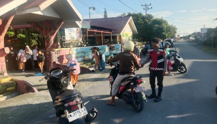 Strong Point Pagi Hari, Polisi Hadir Berikan Rasa Aman bagi Pengguna Jalan di Touna