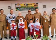 Dukung Akses Pendidikan yang Merata dan Berkualitas, Pemkab Touna Serahkan Bantuan Pakaian Seragam Sekolah