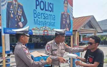 Dekat Diri Bersama Masyarakat, Satlantas Polres Touna Gelar Jumat Berbagi