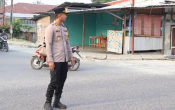 Sukseskan Program 100 Hari Kapolri, Kapolres Touna Turun Langsung Atur Lalu Lintas Pagi Hari
